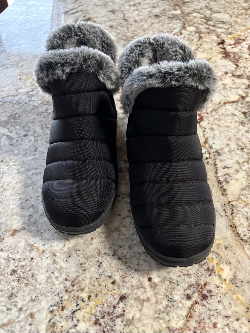 Minnetonka Black Quilted Slip-On Slippers with Gray Faux Fur Trim